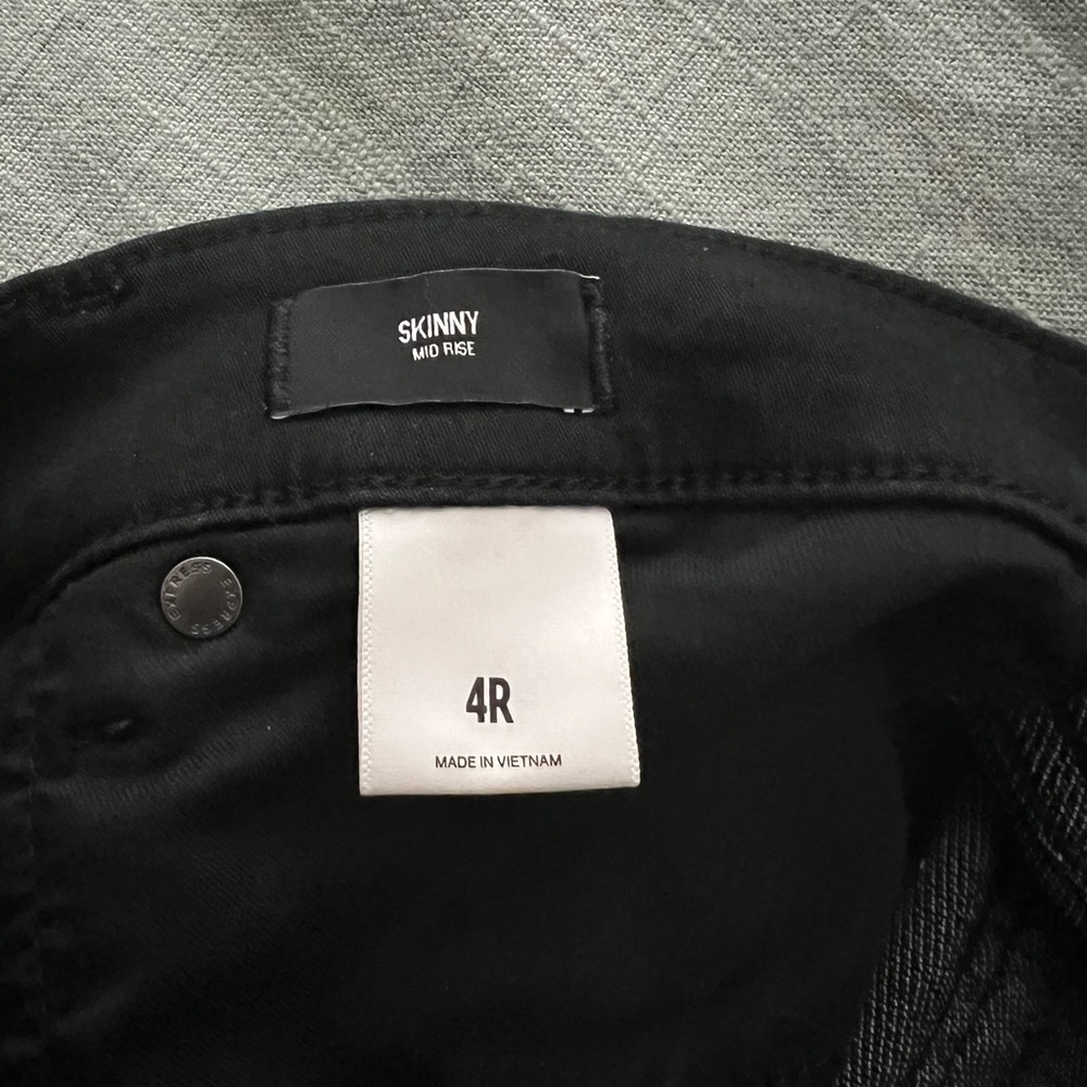 Express Mid Rise Black Raw Hem Skinny Jeans - Picture 3 of 5